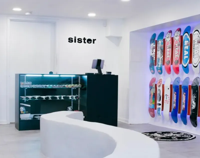 Sister restaurant banner above the counter